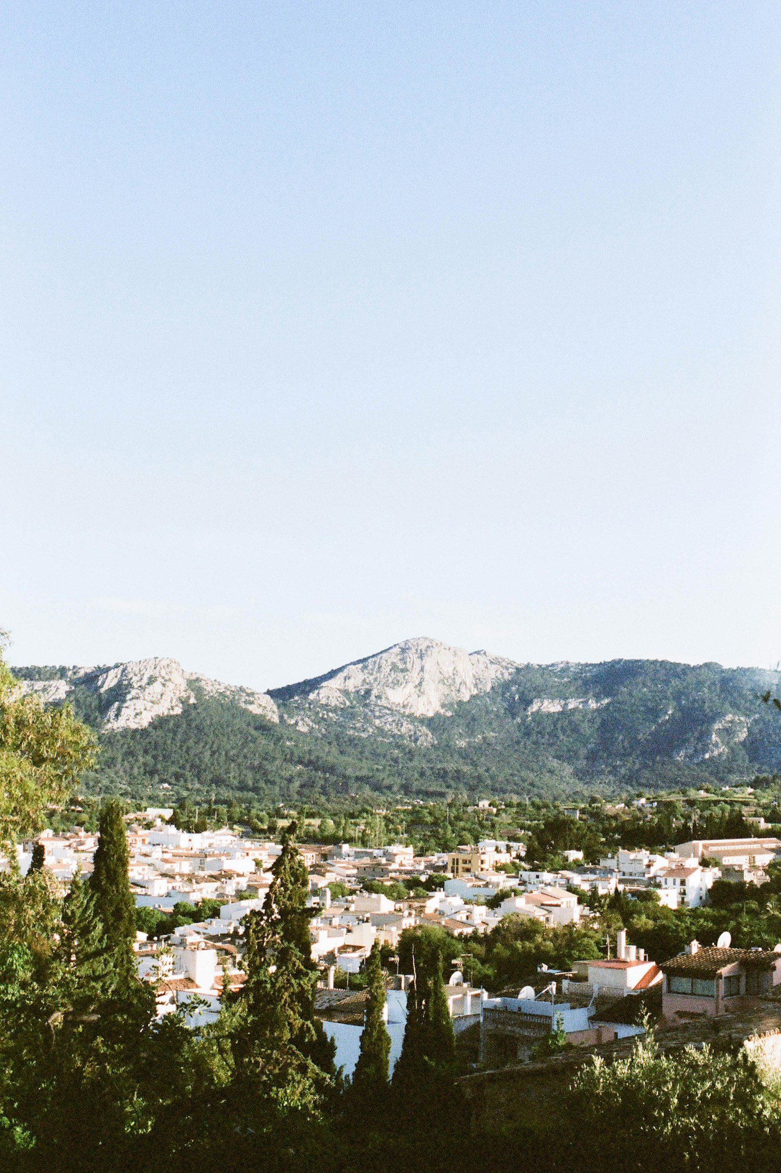 Sunlit view across Deià toward the Tramuntana mountains